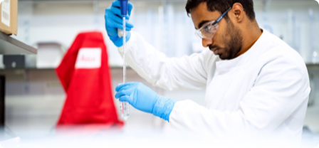 Technician compounding in a sterile environment